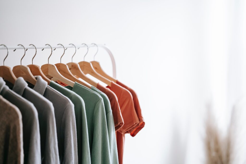 Different designs of clothes hanging on the hangers